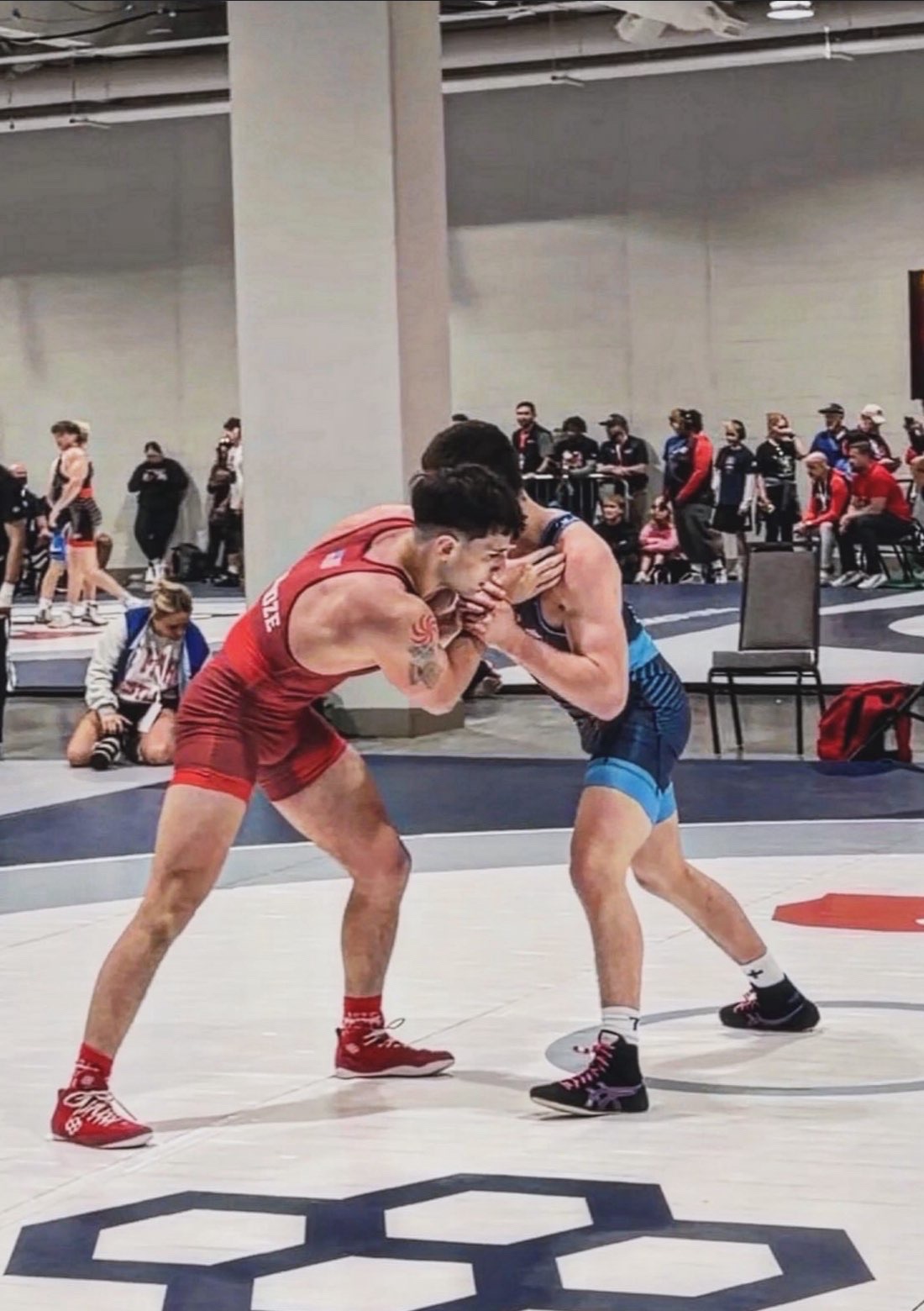 Member competing in wrestling